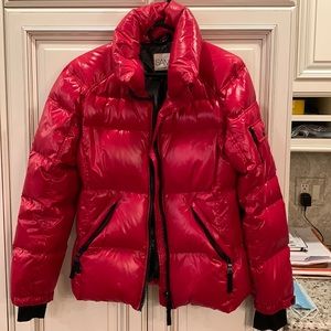 Red puffer jacket